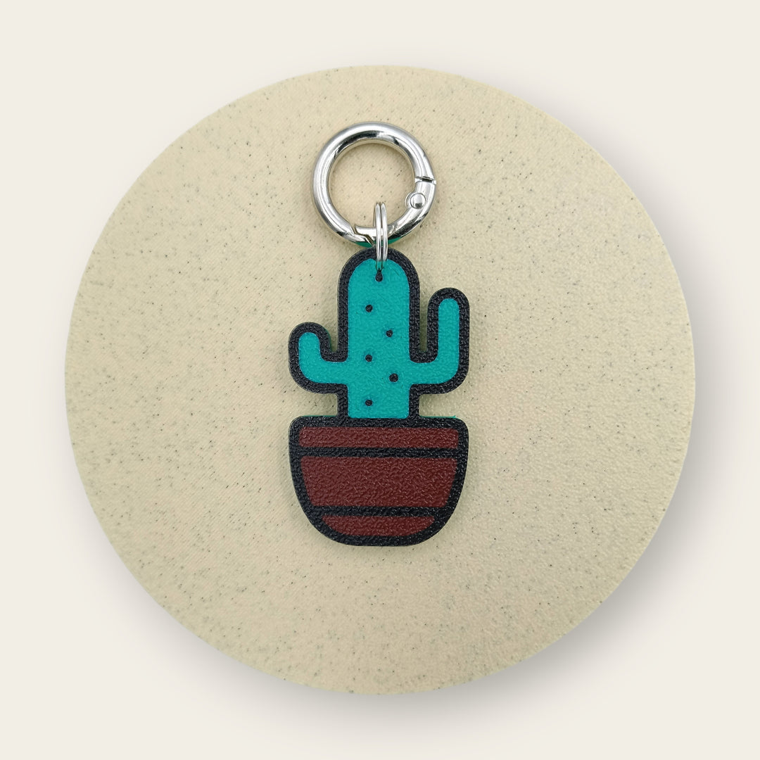 Medalion amuzant si inedit cu forma de cactus, tematica natura, contur negru cu verde si ghiveci maro, printat 3D din PLA - Ubba.