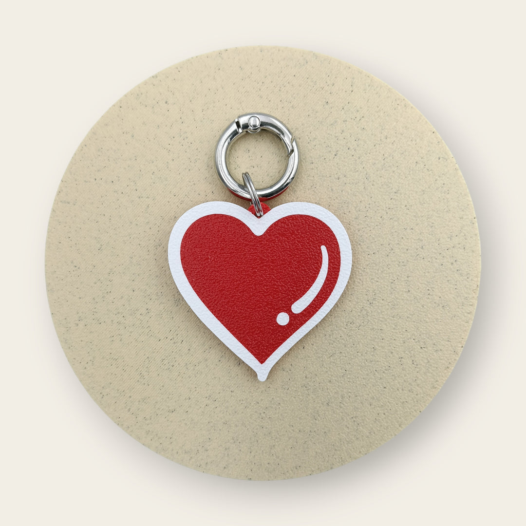 Medalion amuzant si inedit cu forma de inimioara, culoare rosie cu accente albe, printat 3D din PLA - Ubba.