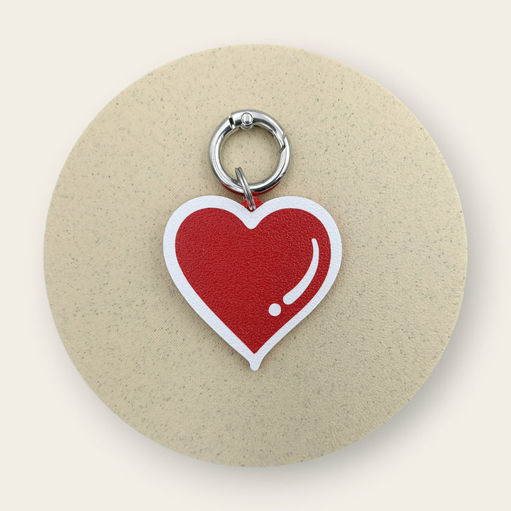 Medalion amuzant si inedit cu forma de inimioara, culoare rosie cu accente albe, printat 3D din PLA - Ubba.